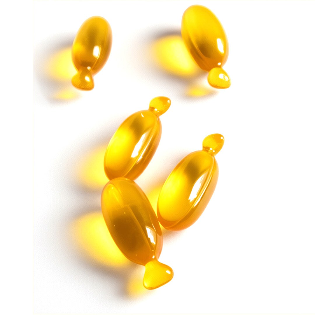 Golden vegan hair oil capsules for strength repair and split-end sealing