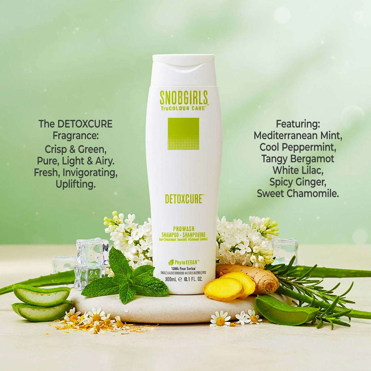 DETOXCURE Prowash vegan hair shampoo bottle surrounded by fresh herbs and flowers highlighting natural, invigorating fragrance ingredients