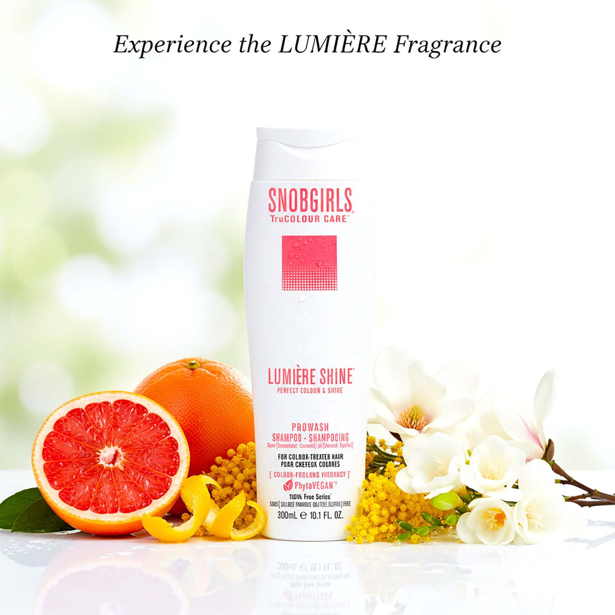 LUMIERE HIGHCURE vegan shampoo bottle with citrus fruits and flowers highlighting color-safe blonde hair care