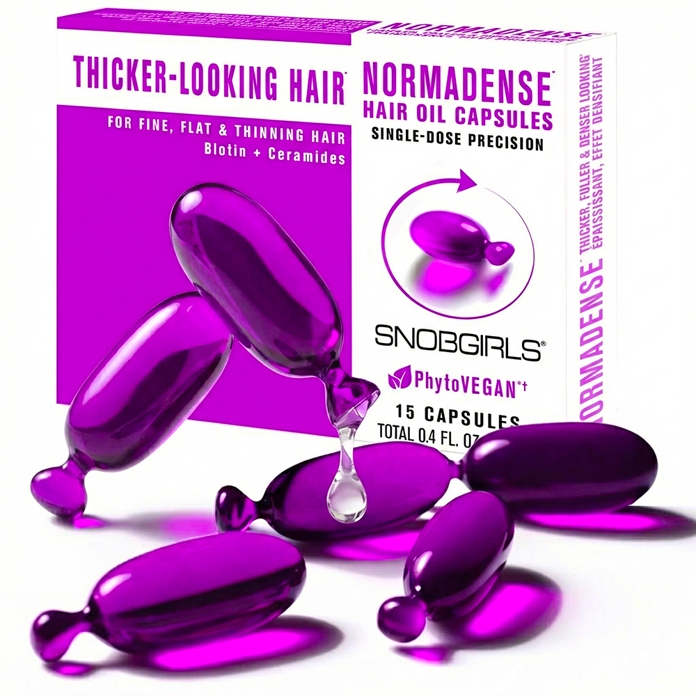 Purple capsules of NORMADENSE vegan hair oil for normal to thin hair nourishing and strengthening strands