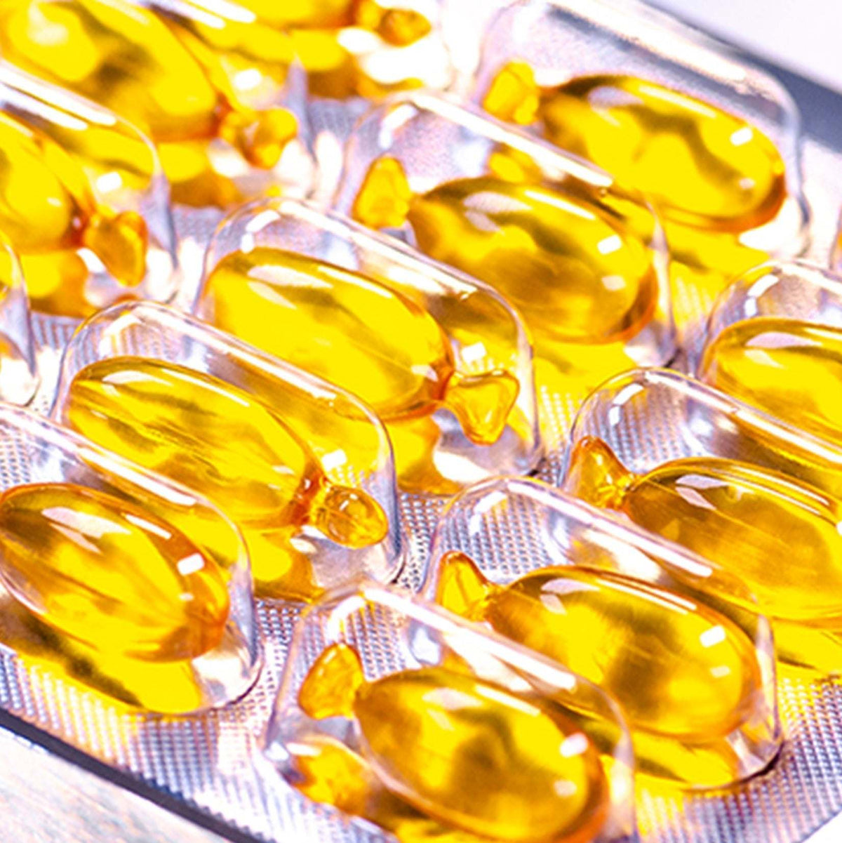 Close-up of Trio STRONGFORCE Vegan Hair Oil Capsules for hair repair and nourishment