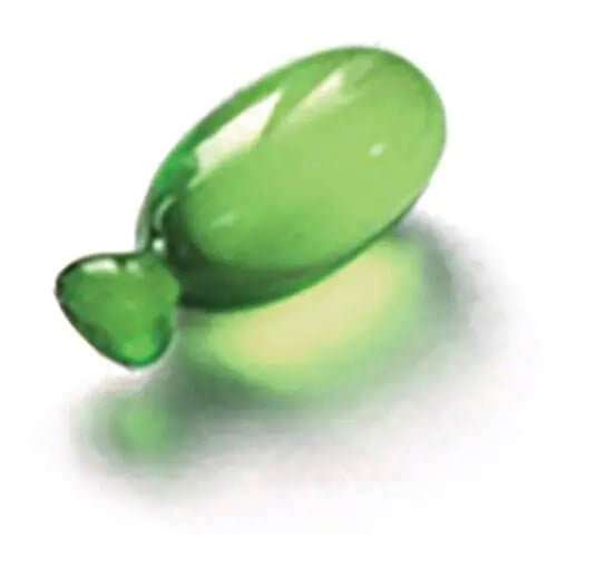 Green translucent capsule of PRO BACKBARBOX hair colour additive for hair protection and colour perfection